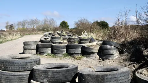 Stacks of used, part-worn tyres