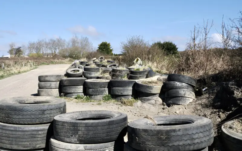Stacks of used, part-worn tyres