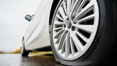 Under-inflated tyre on a car