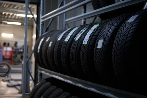 Brand new tyres on a shelf