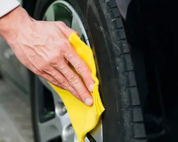 Man keeping his tyres in good shape