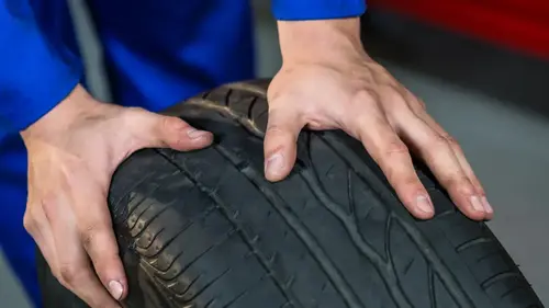 Worn car tyre tread